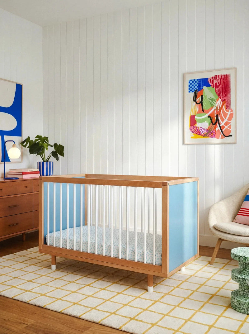 Bold Baby Cot in Blue and Deep Blue colourway, front view showing the blue panel