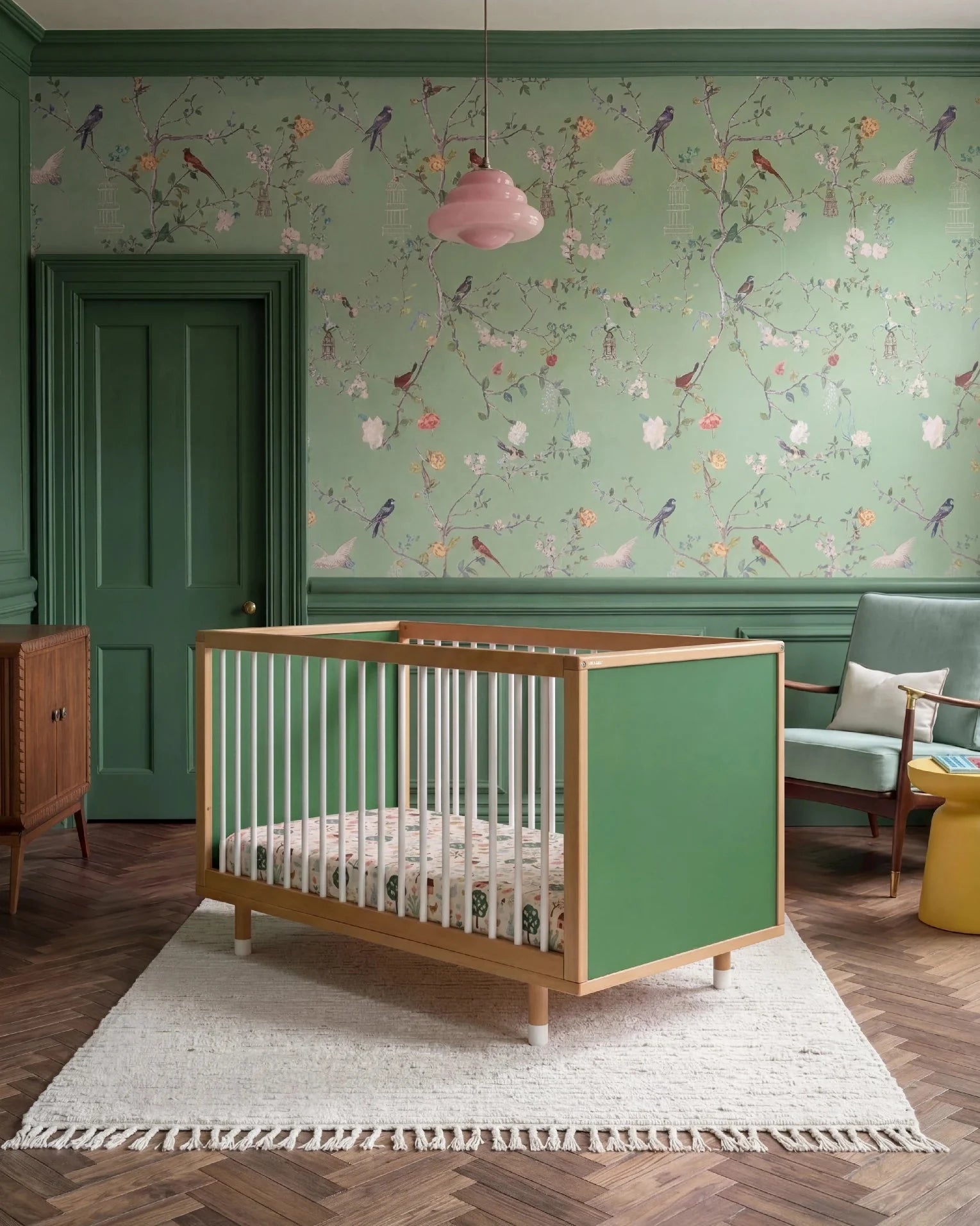 Bold Baby Cot in Pink and Green colourway, front view showing the green panel