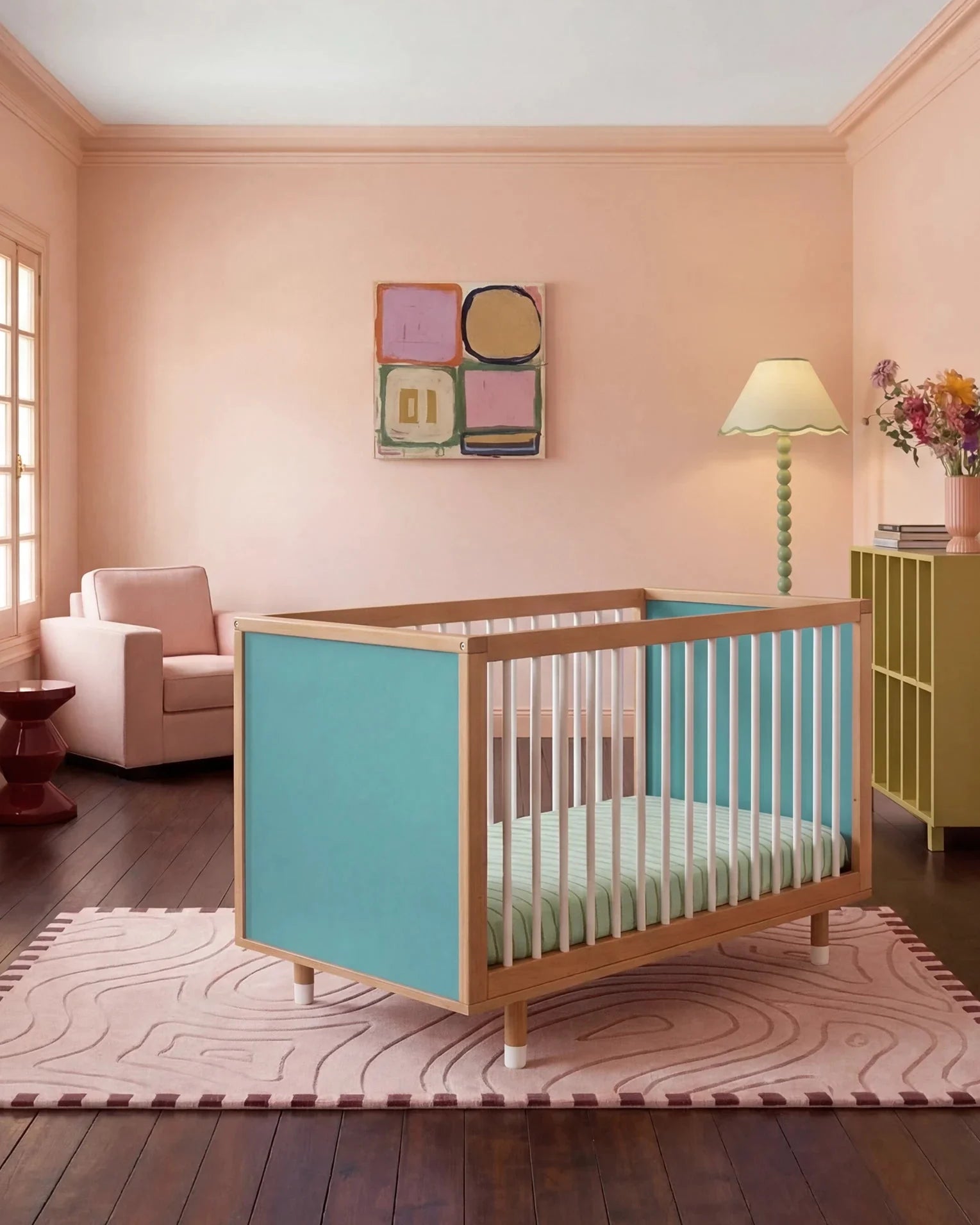 Bold Baby Cot in Lilac and Teal colourway, front three-quarter view showing the teal panel