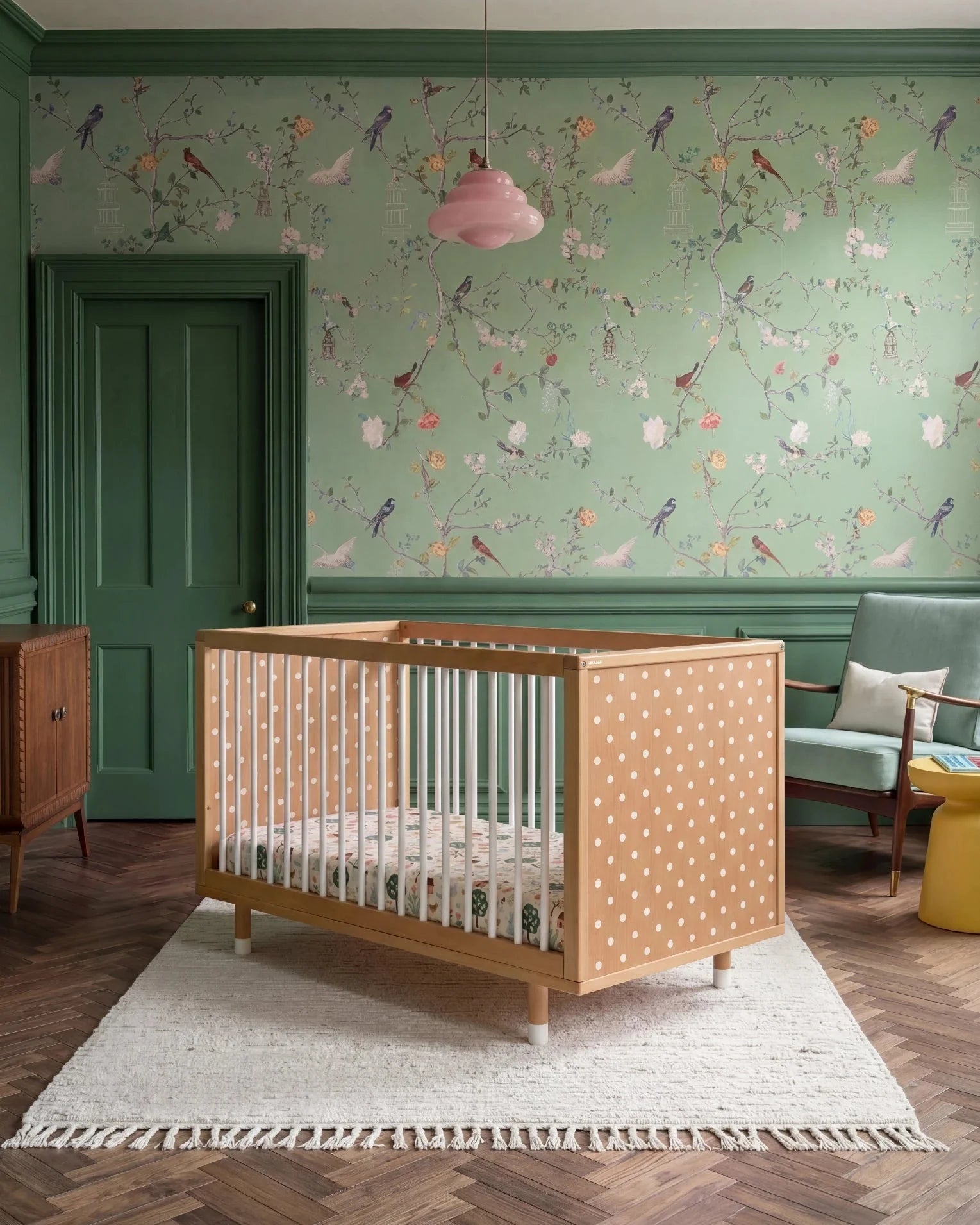 Bold Baby Cot in Pink and Green colourway, front view showing the polkadot panel