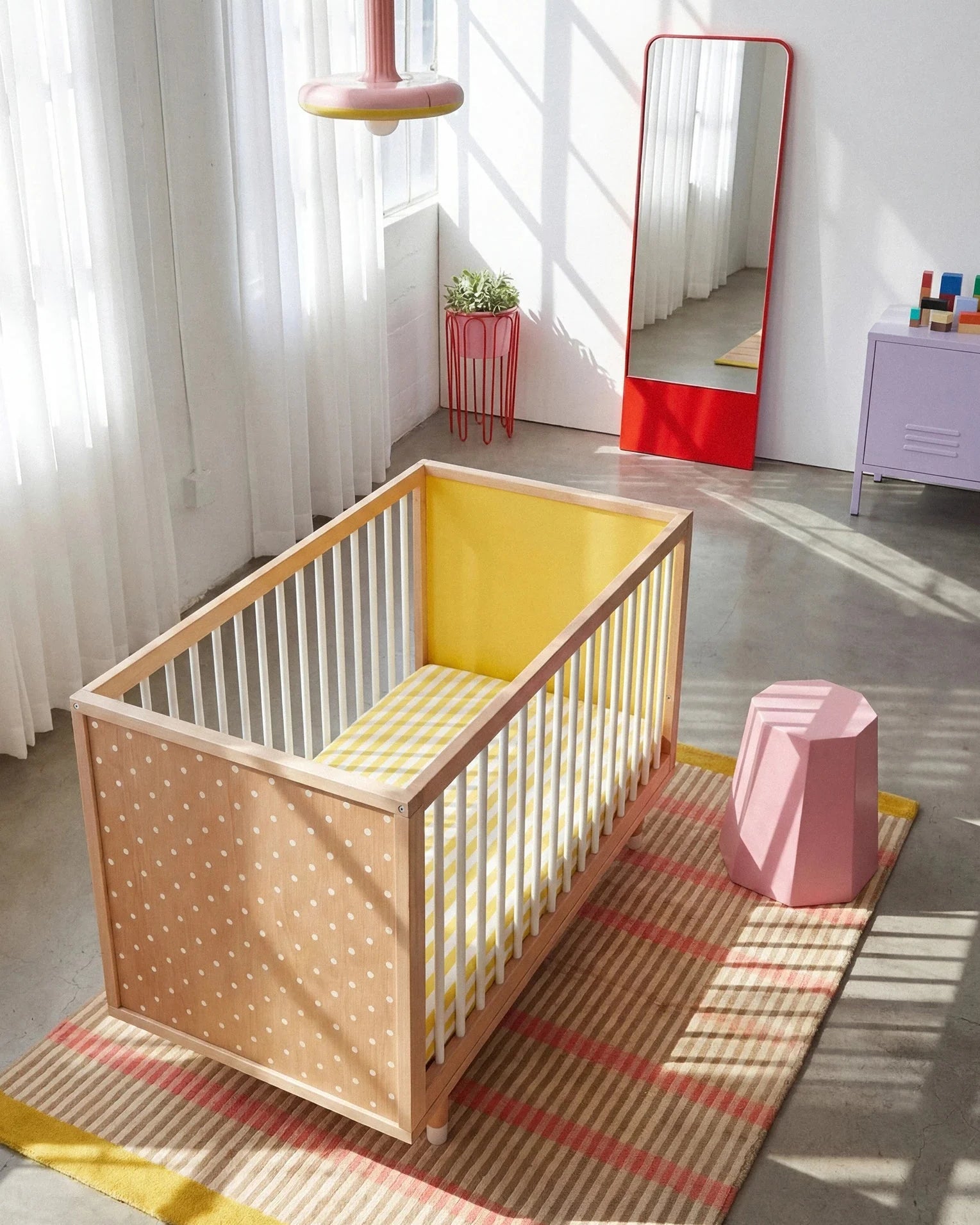 High overhead view of the Yellow and Mint Bold Baby Cot