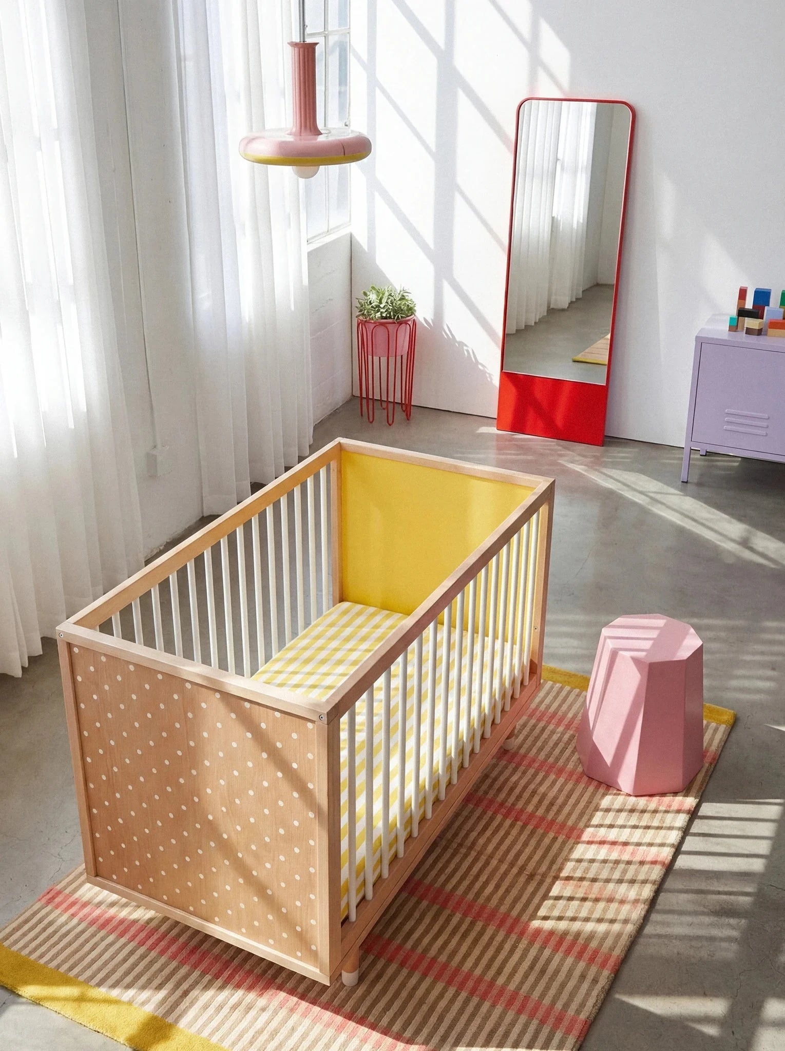 High overhead view of the Yellow and Mint Bold Baby Cot