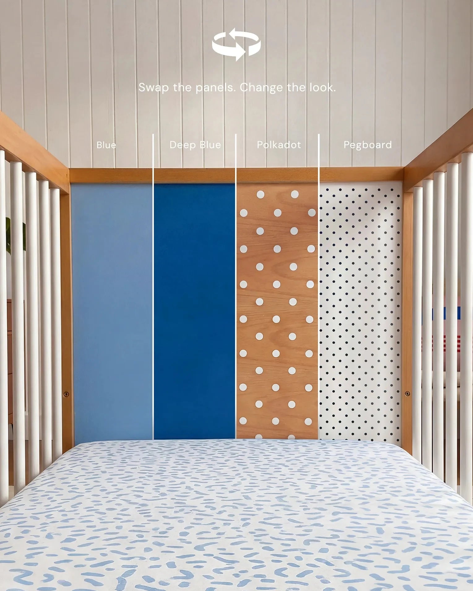 Demonstrating the interchangeable panel swap on the Blue and Deep Blue Bold Baby Cot