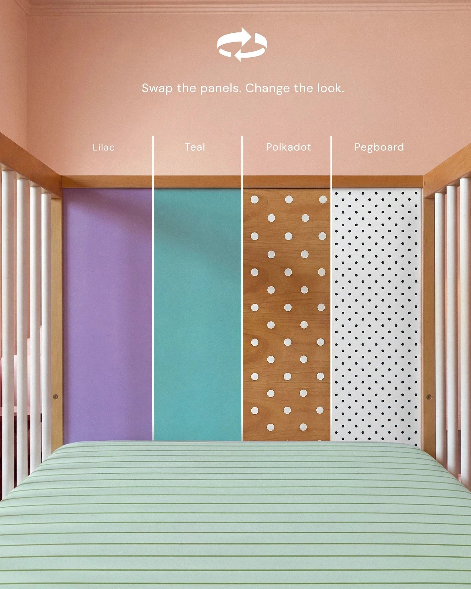 Interior view of the Lilac and Teal Bold Baby Cot showing the interchangeable panel system.