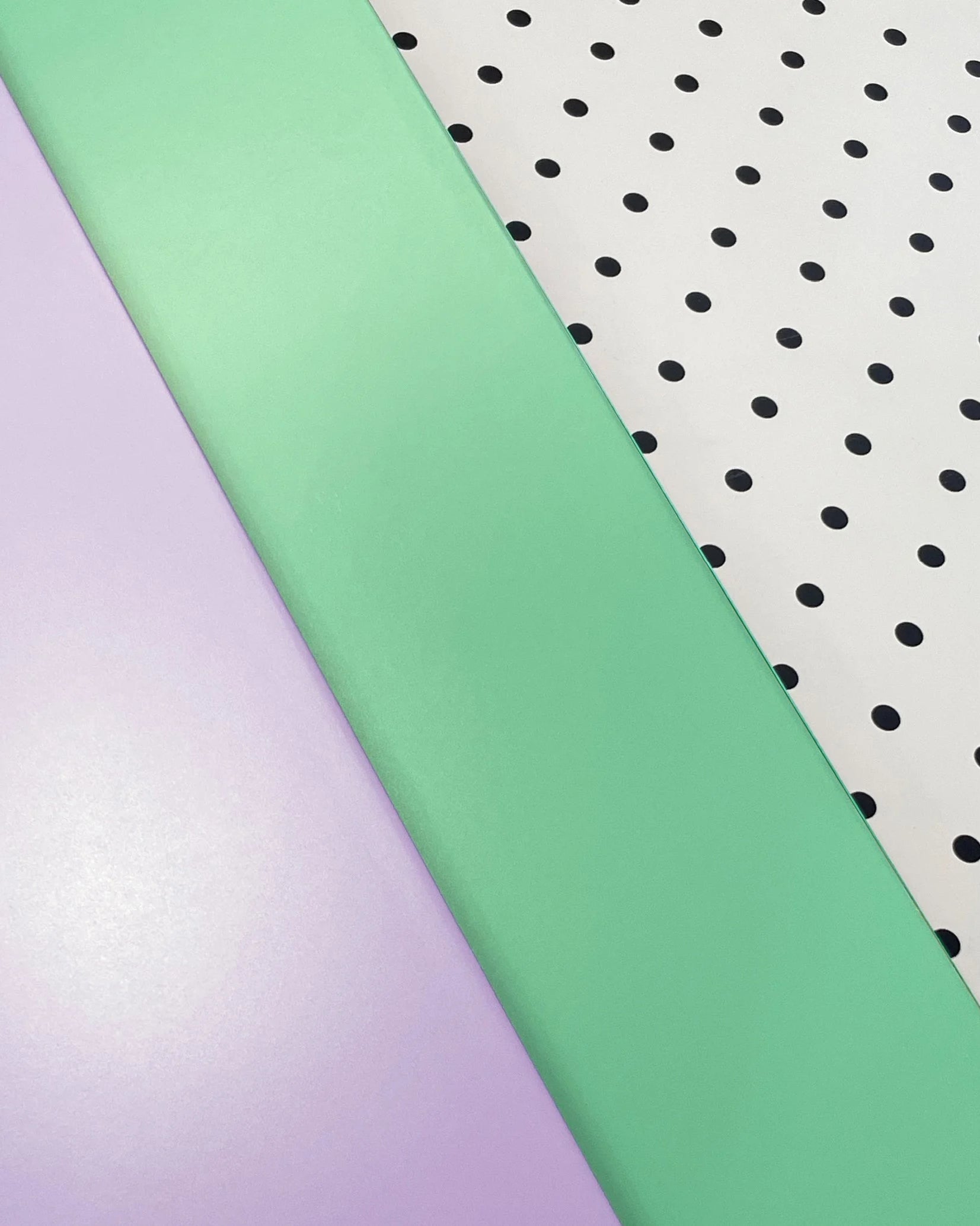 Lilac, Teal and pegboard panels of the Bold Baby Cot