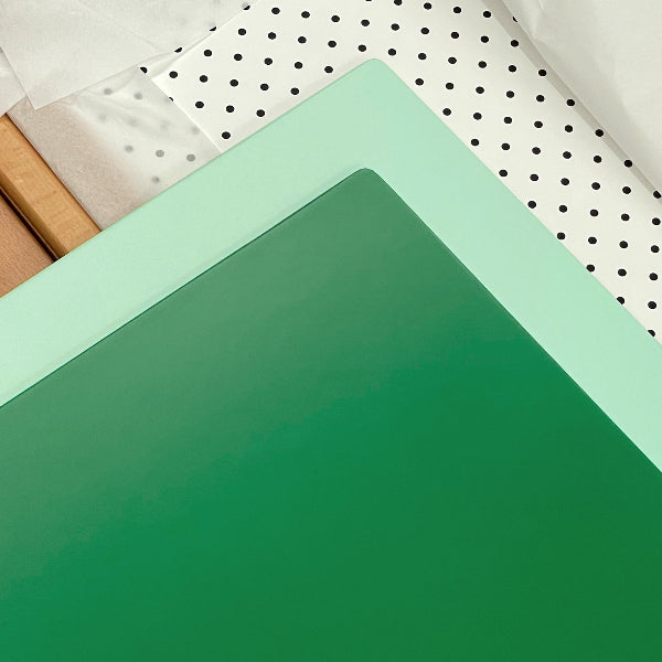 Green and mint boards with polkadots