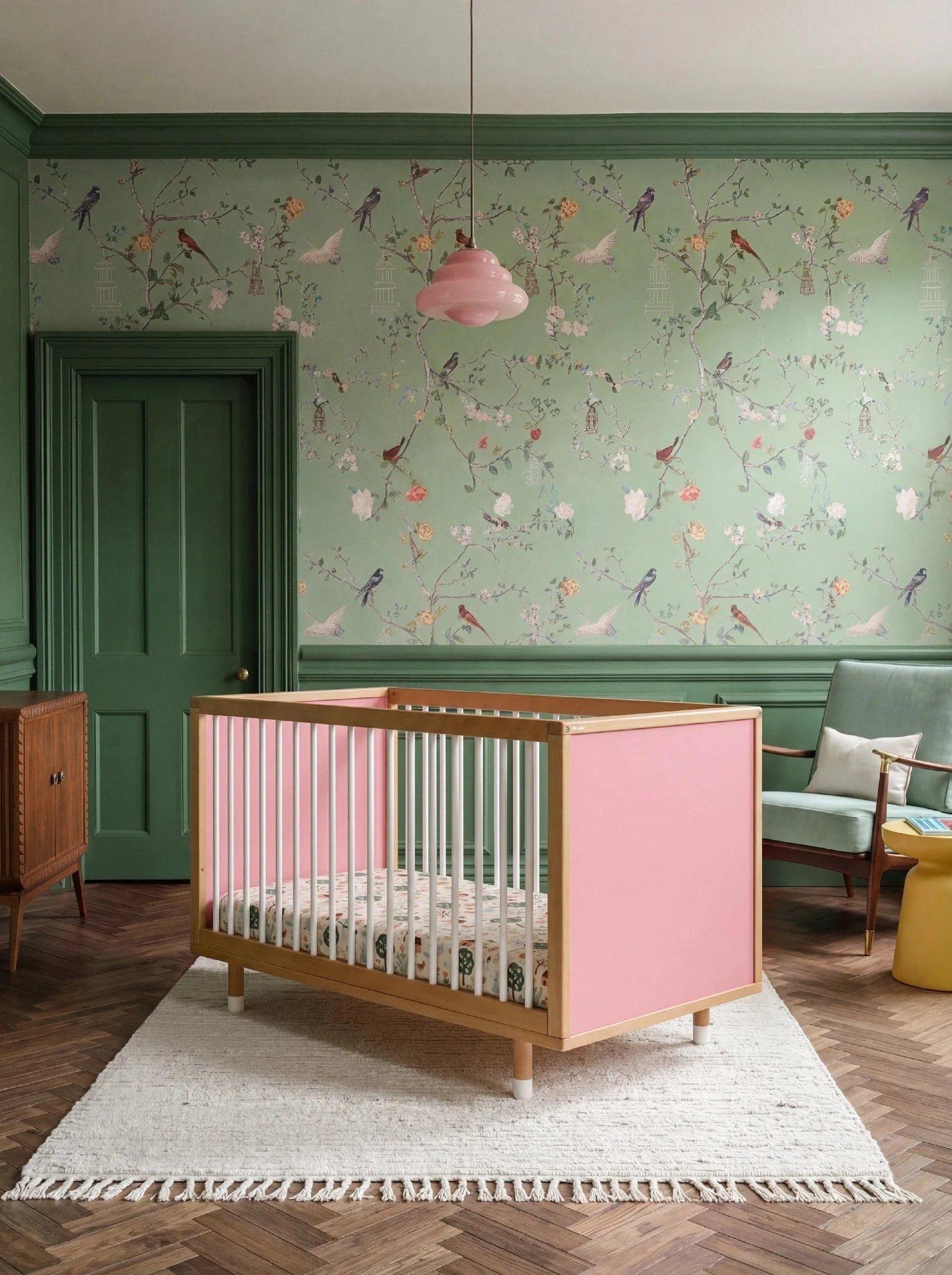 Bold Baby Cot in Pink and Green colourway, front view showing the pink panel