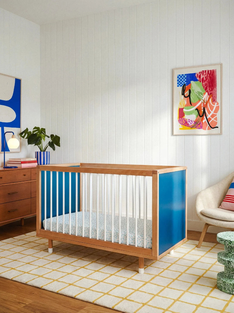 Bold Baby Cot in Blue and Deep Blue colourway, front view showing the deep blue panel