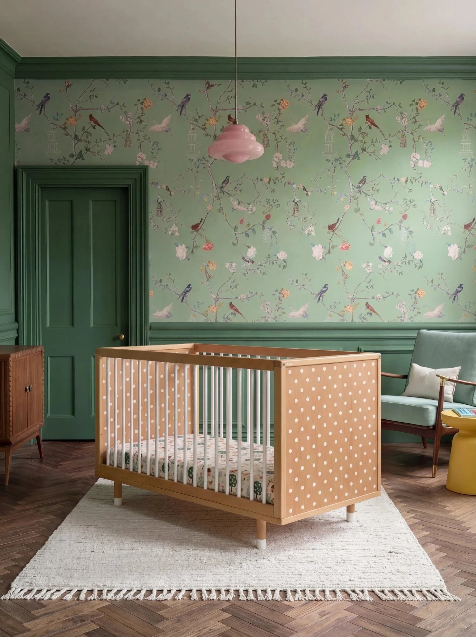 Bold Baby Cot in Pink and Green colourway, front view showing the polkadot panel