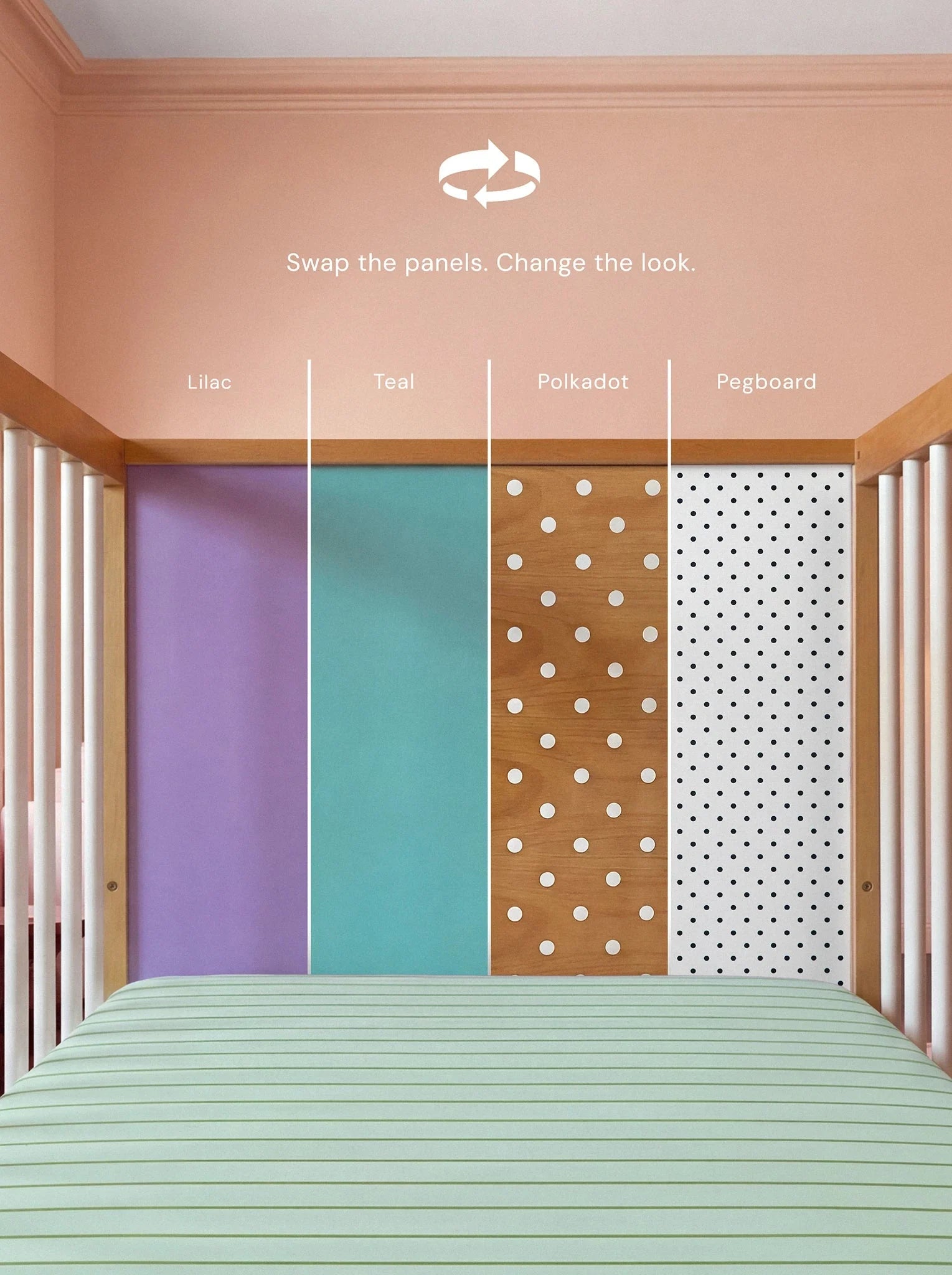 Interior view of the Lilac and Teal Bold Baby Cot showing the interchangeable panel system.