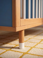 Detail of the adjustable leg on the Blue and Deep Blue Bold Baby Cot