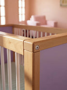 Close-up corner detail of the Lilac and Teal Bold Baby Cot panel