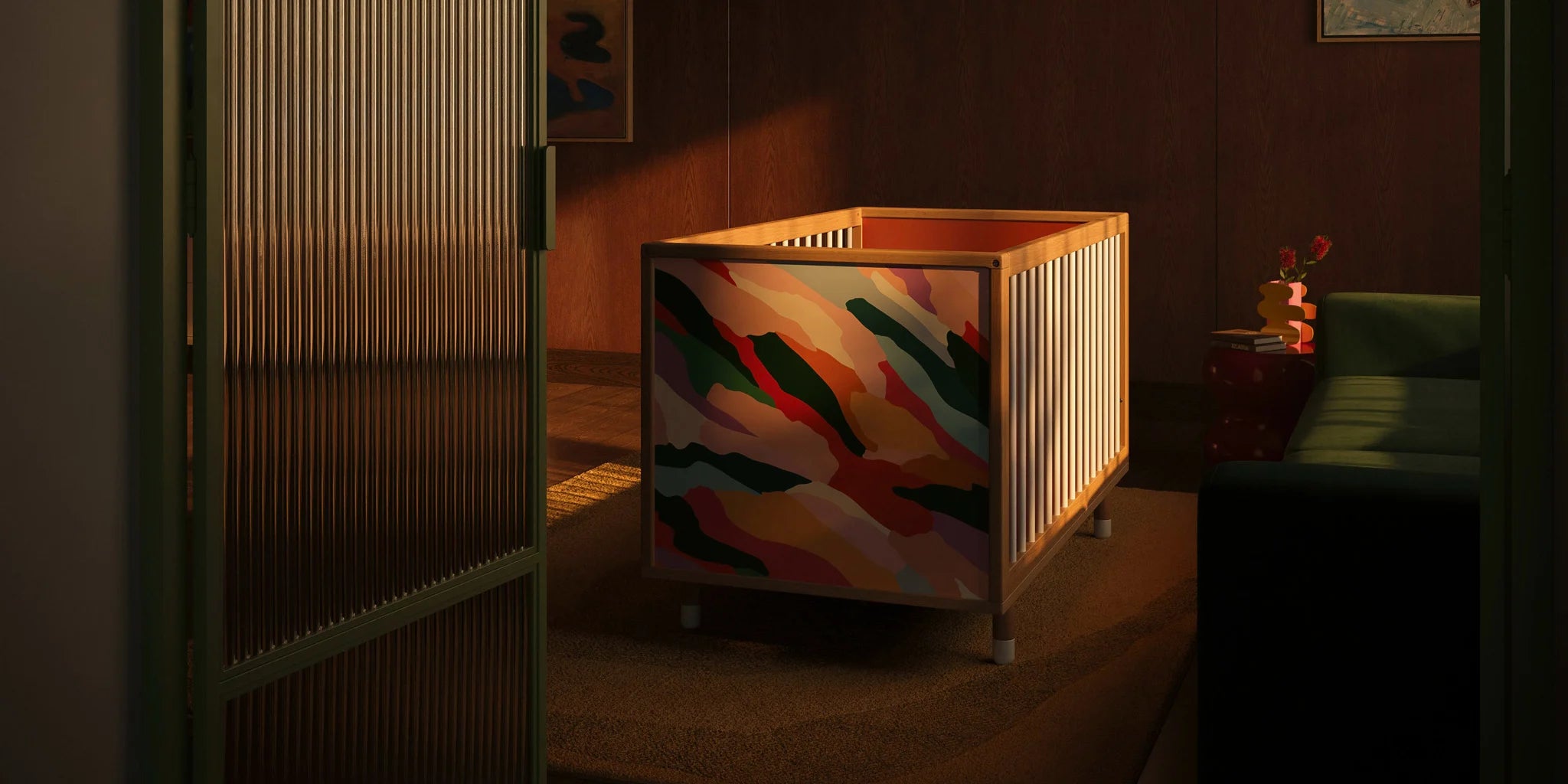 Designer cot with abstract art by Janelle Burger, in a stylish nursery