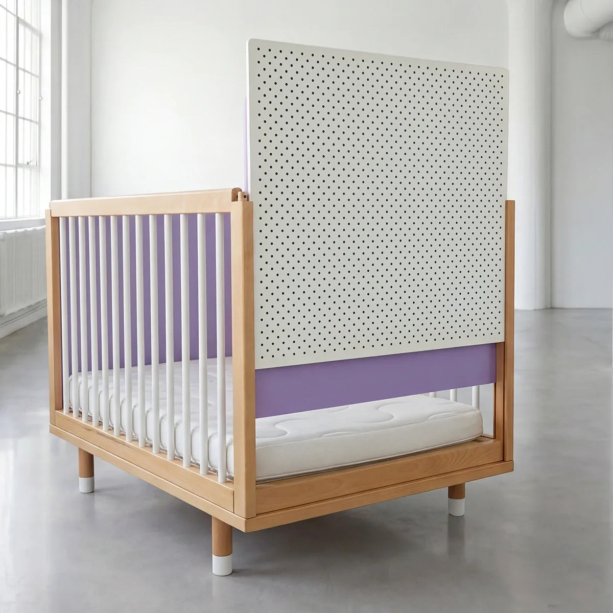 Modern crib with wooden frame, white mattress, and purple side railings in a minimalistic room.
