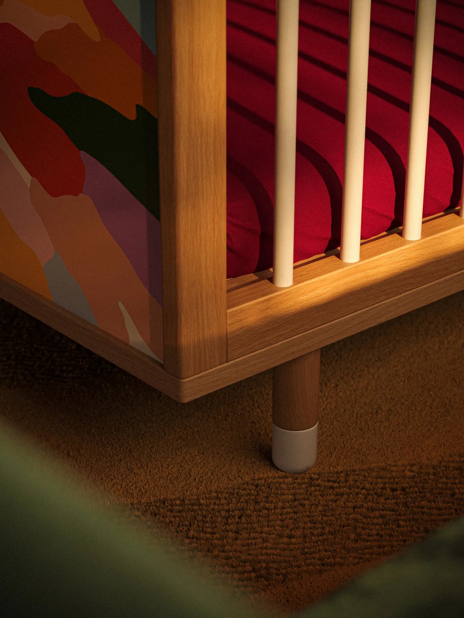 Adjustable leg and panel detail of the Bold Baby Art Series cot